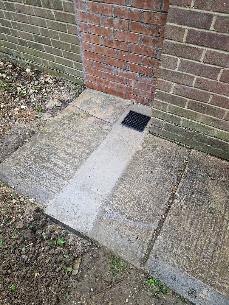 Exterior drain cover for efficient water drainage and property protection.