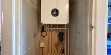 Efficient boiler setup by Centra Drains Ltd for optimal heating performance.